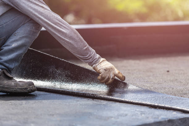 Professional Waterproofing technician working in Glencoe, AL